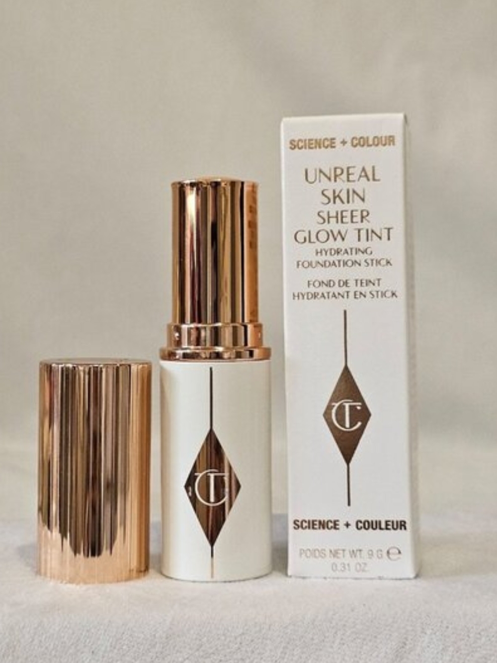 Charlotte unreaI Skin Sheer Glow Tint Hydrating Foundation Stick In 7 Medium